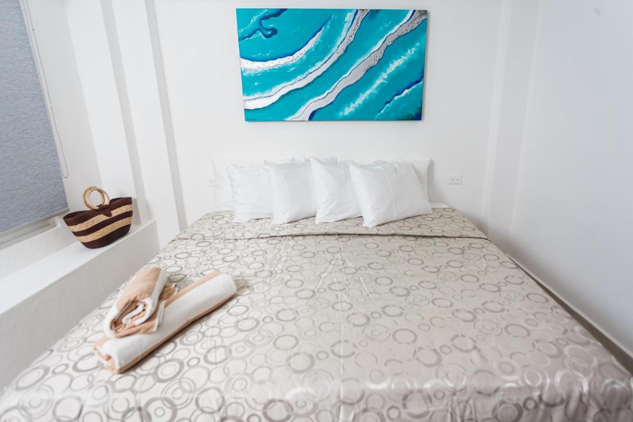Kaam Accommodations بويرتو موريلوس المظهر الخارجي الصورة
